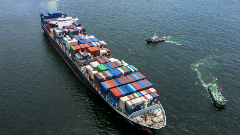 Aerial view container ship cargo freight shipping maritime vessel