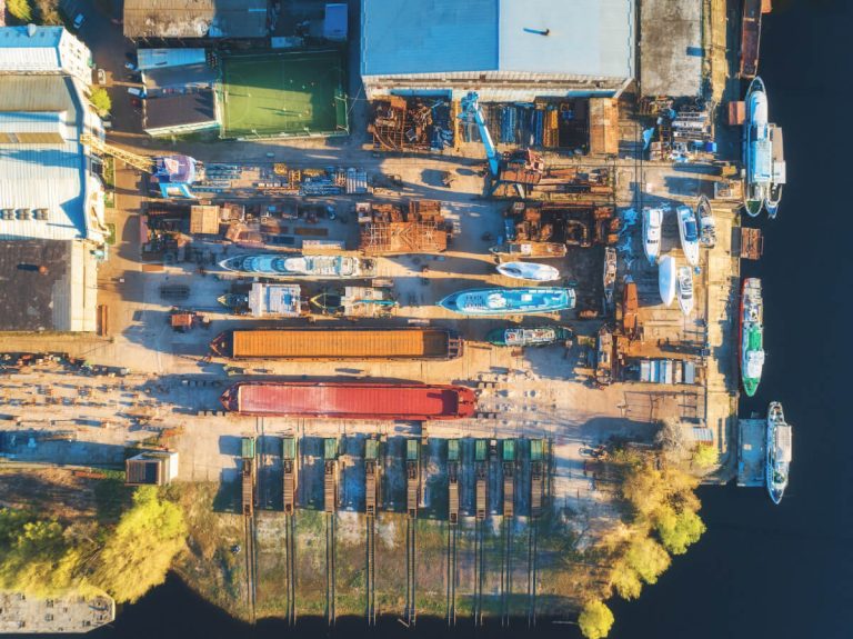 Aerial view of ships and boats in dry dock